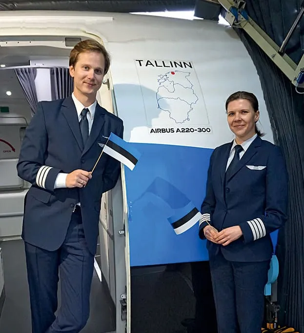 Crew in front of special livery aircraft